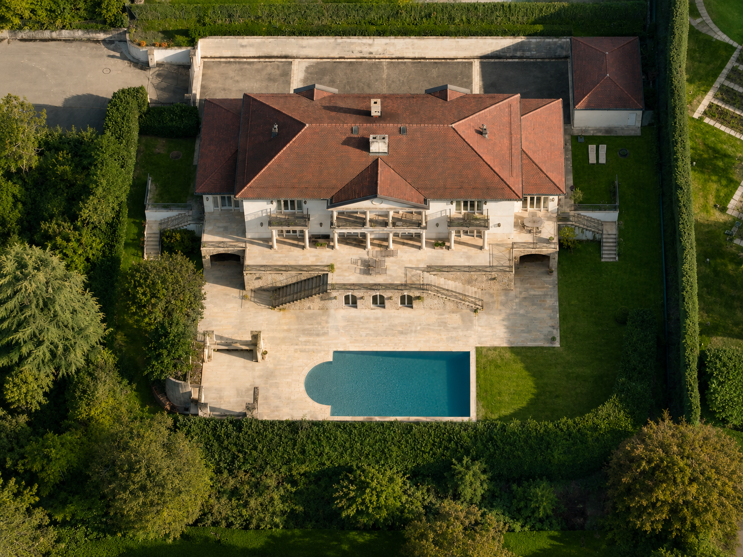 Overhead aerial view of private villa estate with pool, Cologny, Geneva
