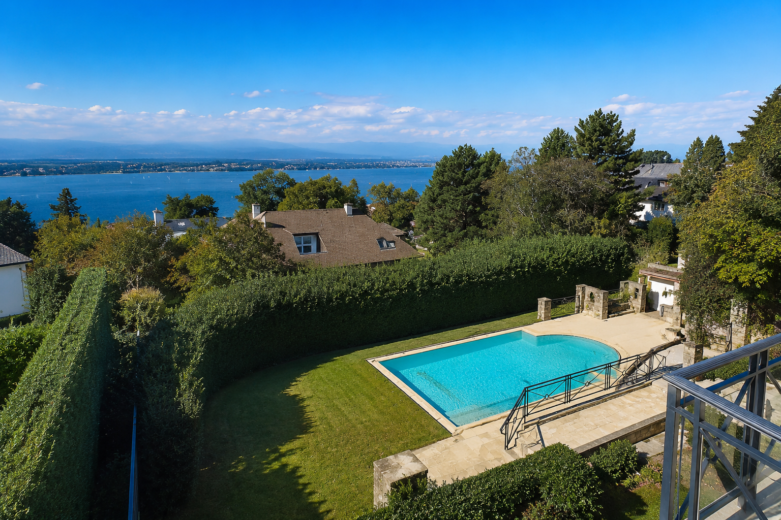Aerial view of private estate pool with Lake Geneva panorama, Cologny
