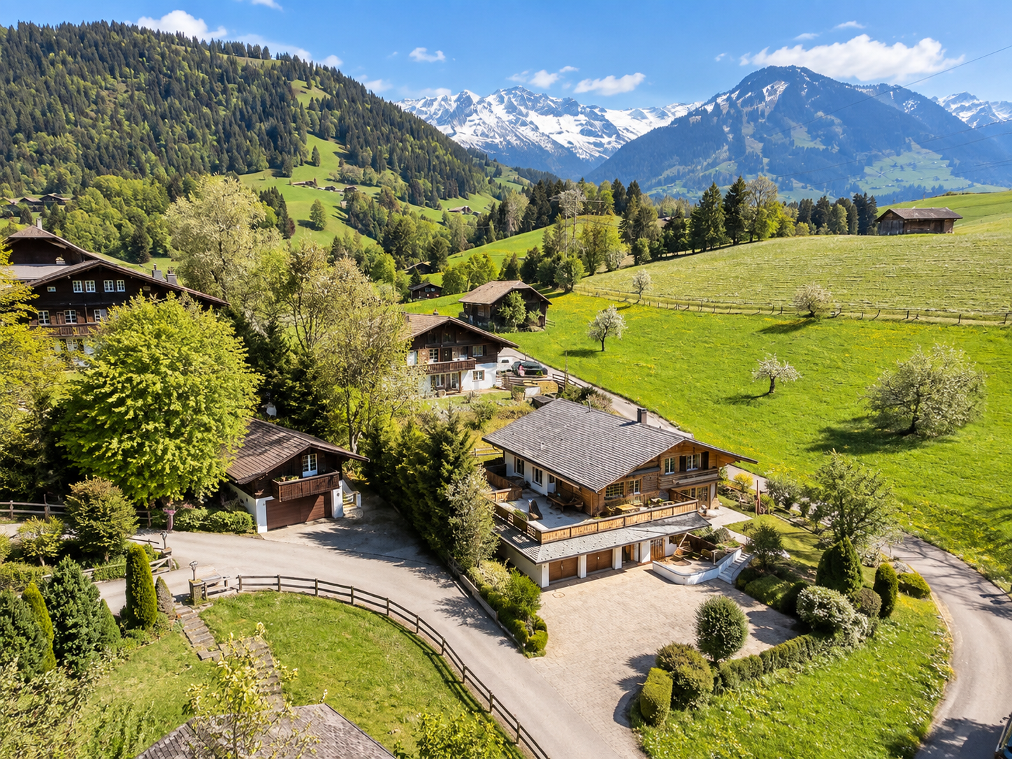 Exceptional family chalet exterior — elevated hilltop setting near Gstaad, Saanen