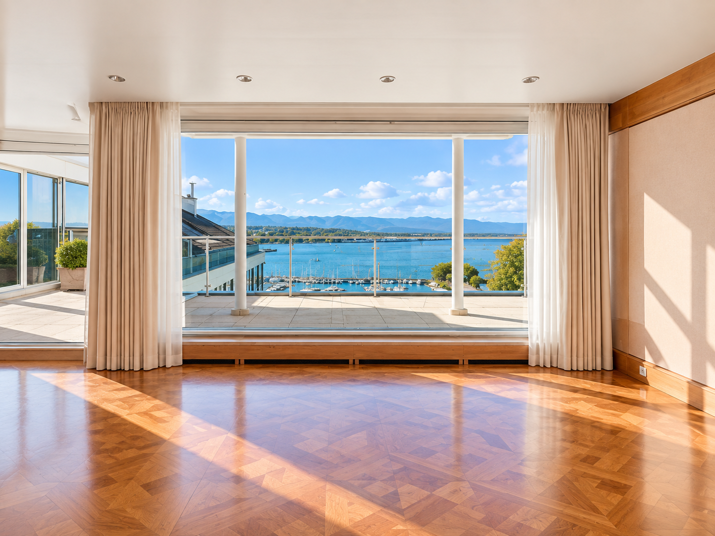 Geneva duplex penthouse — dining area with direct lake views