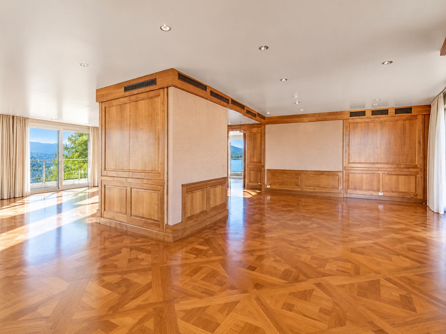 Geneva duplex penthouse — terrace with panoramic Lake Geneva and mountain views