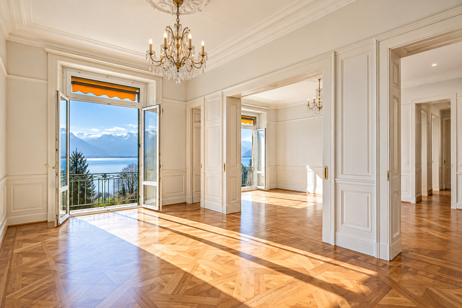 Riant-Château Montreux — grand salon avec parquet, lustre et vue panoramique sur le lac Léman