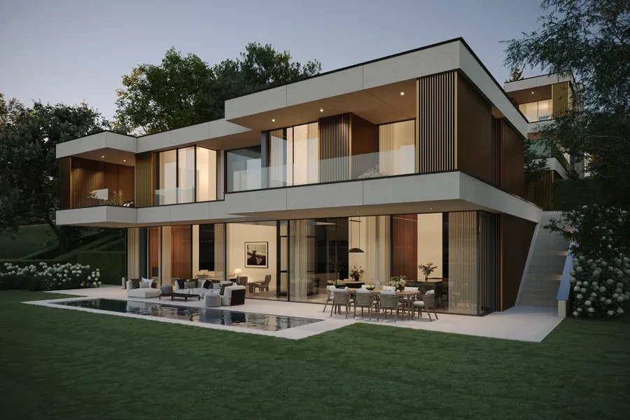 Cologny Geneva new-build villa — contemporary exterior with outdoor pool and terrace illuminated at dusk