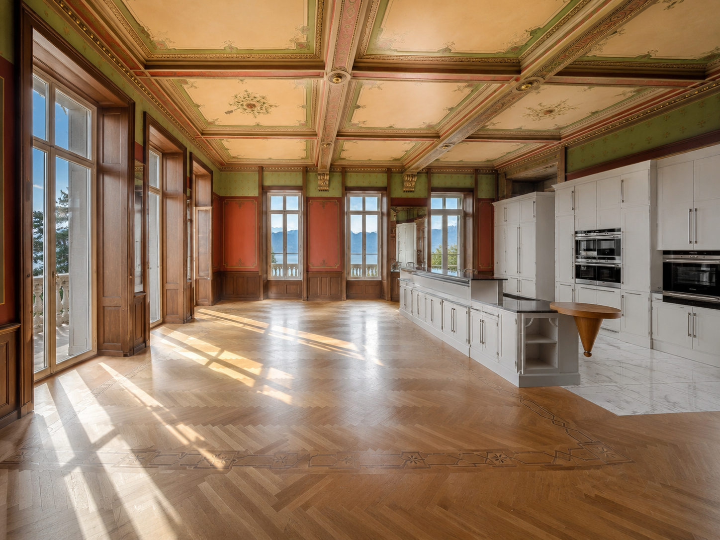 Le National Belle Époque residence Montreux — open-plan kitchen integrated into the expansive reception area with high-quality finishes and natural light