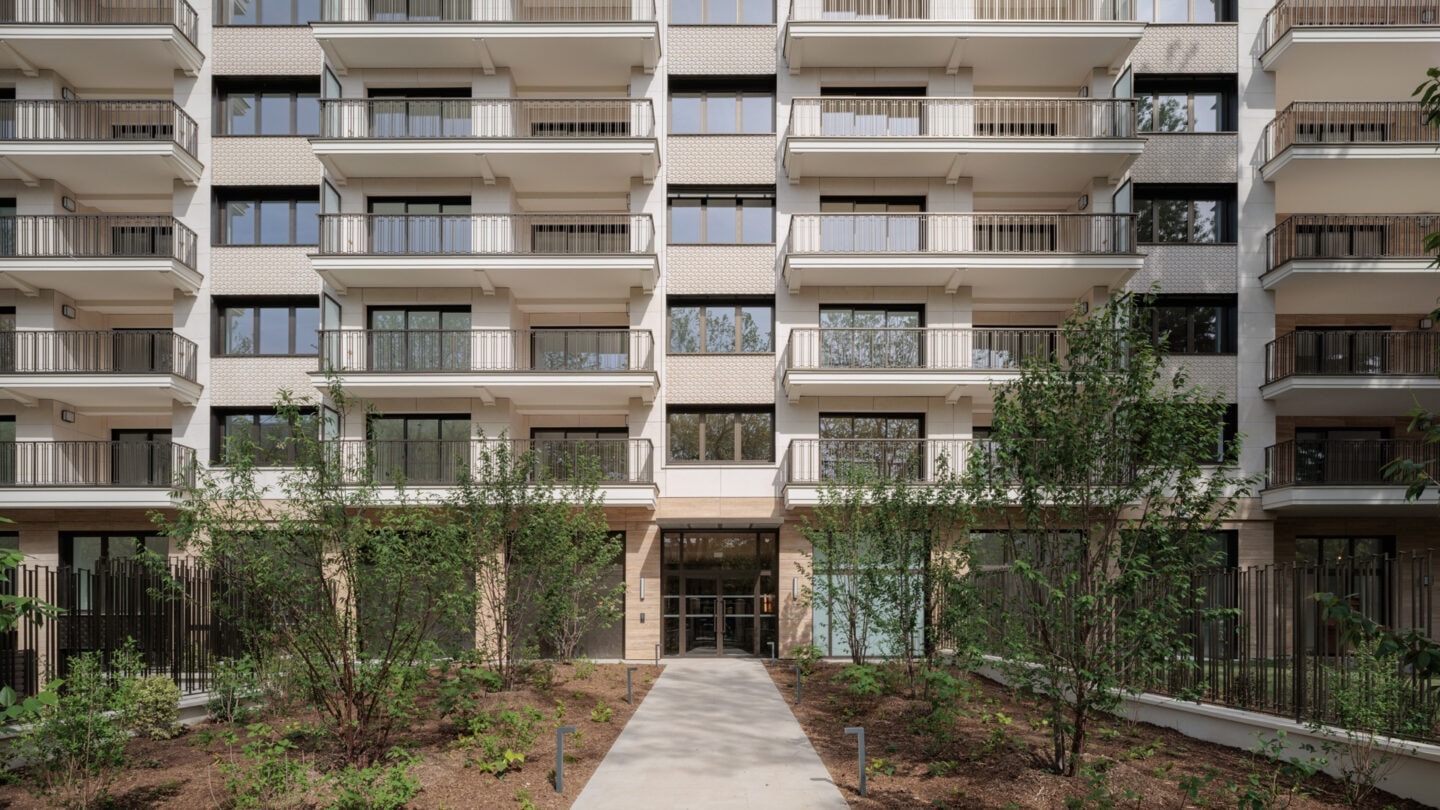 Elegant new residential building facade with landscaped entrance, Neuilly-sur-Seine