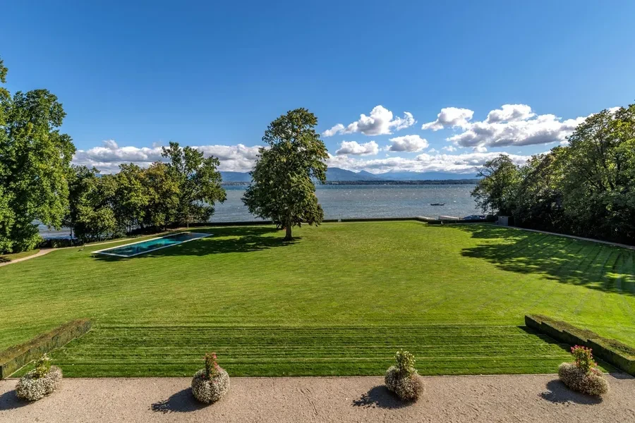 Estate grounds with pool and lake view