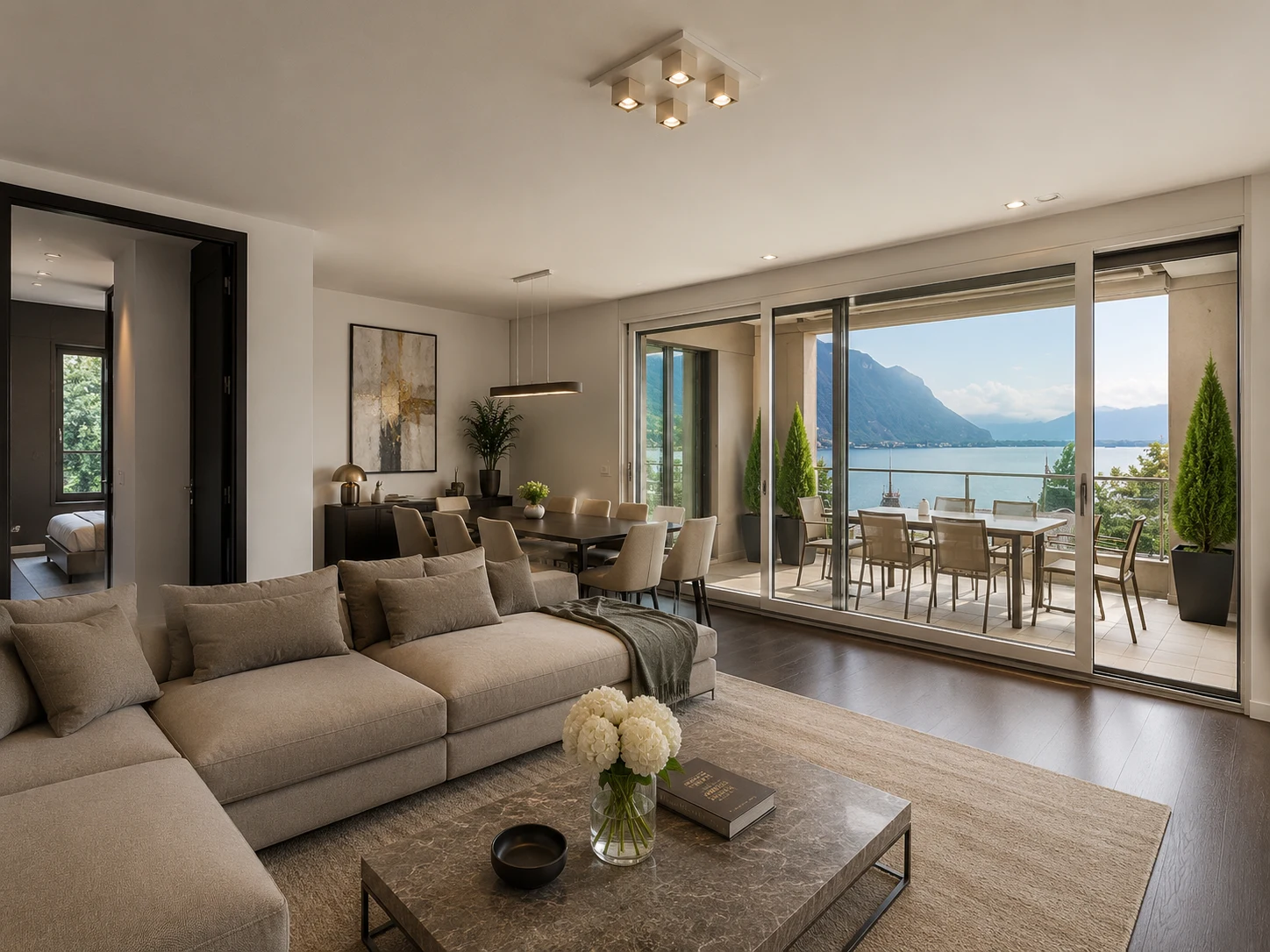 Séjour en open space avec vue panoramique sur le lac Léman et terrasse au Le National Montreux